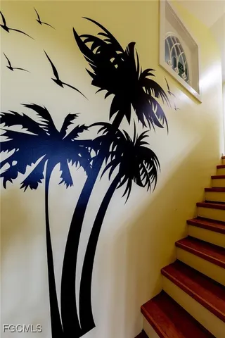 a bedroom with double bed and a lamp