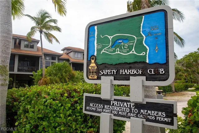 a view of a door of the house with an entrance gate