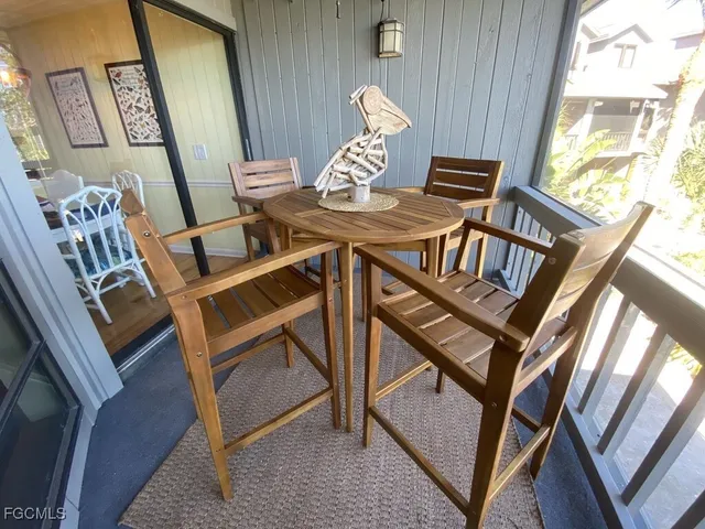 a view of an outdoor dining space with furniture