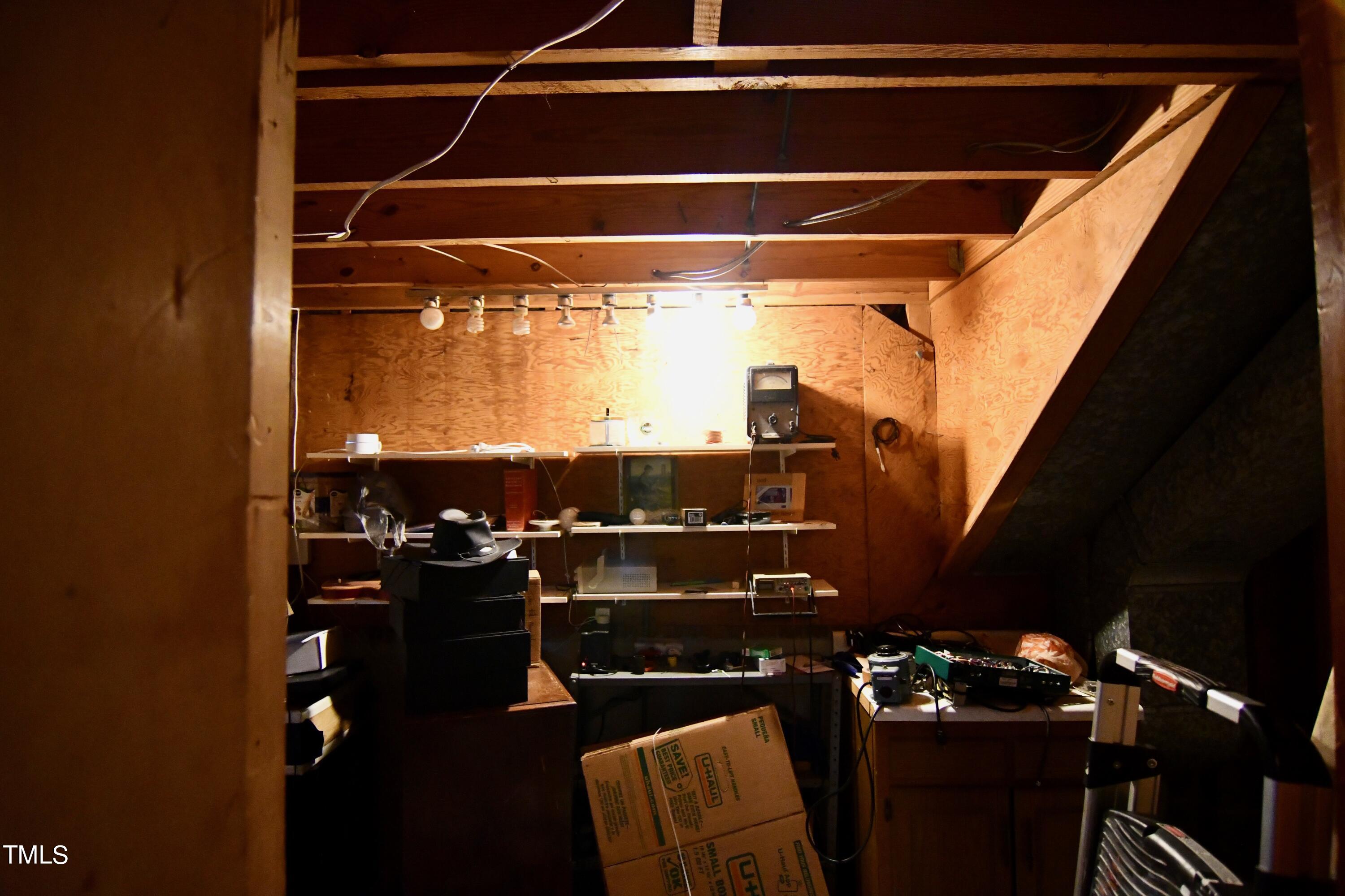 1401 North King Charles Road Raleigh, NC 27610 - Photo 17 of 21 Heated workshop area in basement