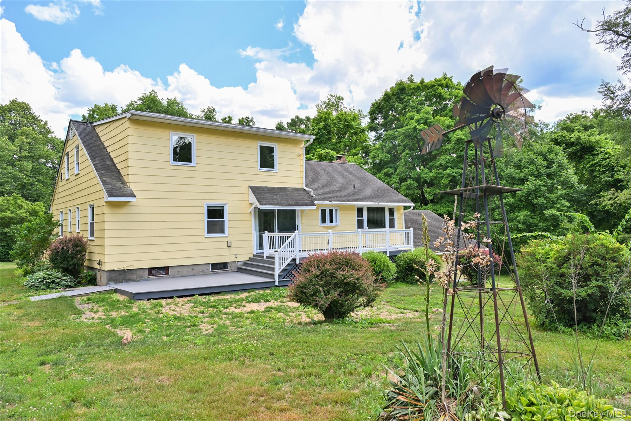 136 Foggintown Road Brewster, NY 10509 - Photo 49 of 50 a view of a house with backyard and garden