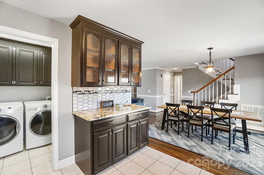 6715 Faith Road Salisbury, NC 28146 - Photo 20 of 48 a kitchen with sink cabinets and appliances