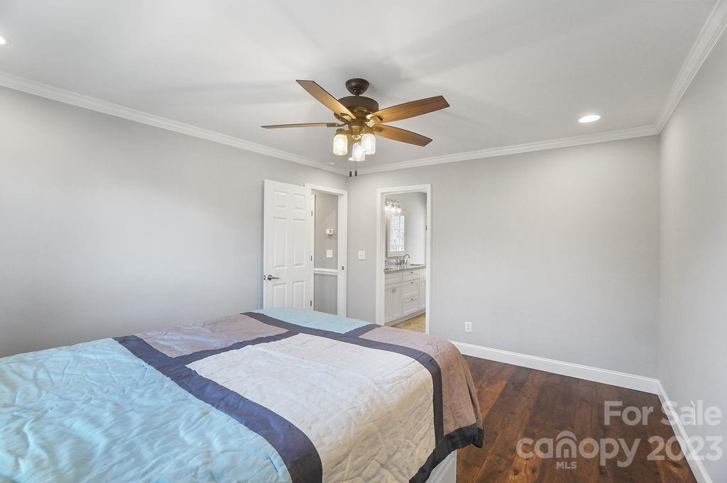 6715 Faith Road Salisbury, NC 28146 - Photo 23 of 48 a bedroom with a bed and window