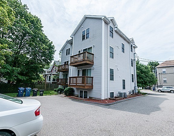41 West Street, Unit 3 Boston, MA 02136 - Photo 15 of 23 a car parked in front of a house