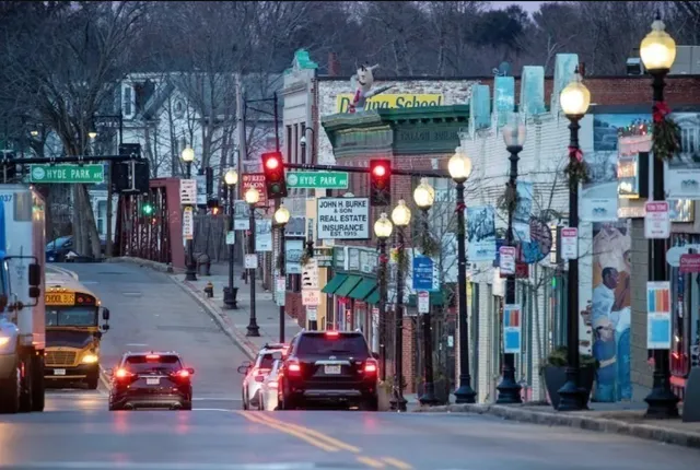 a front view of a building with street view