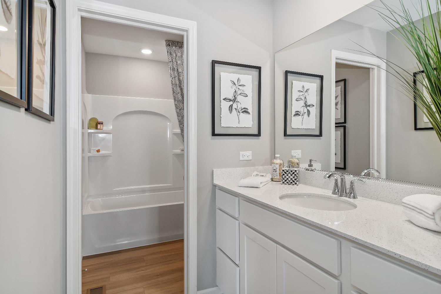 11566 Clyde Crown Point Merrillville, IN 46410 - Photo 18 of 27 a bathroom with a sink and a mirror