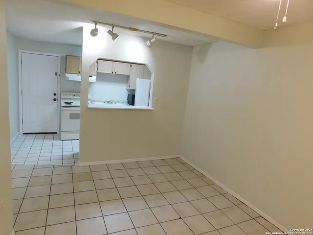 a view of a utility room with closet