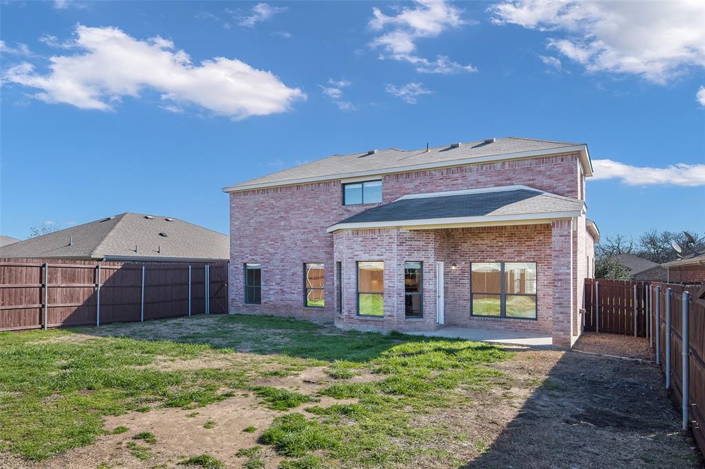 826 Hazel's Way Anna, TX 75409 - Photo 25 of 25 a front view of a house with a garden