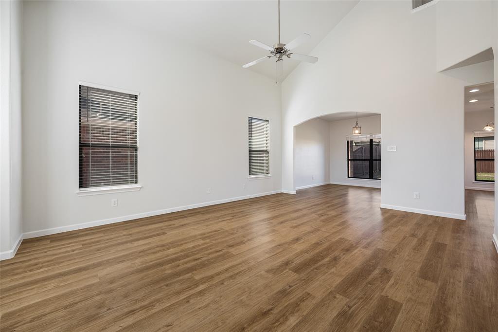 826 Hazel's Way Anna, TX 75409 - Photo 4 of 25 a view of empty room with wooden floor
