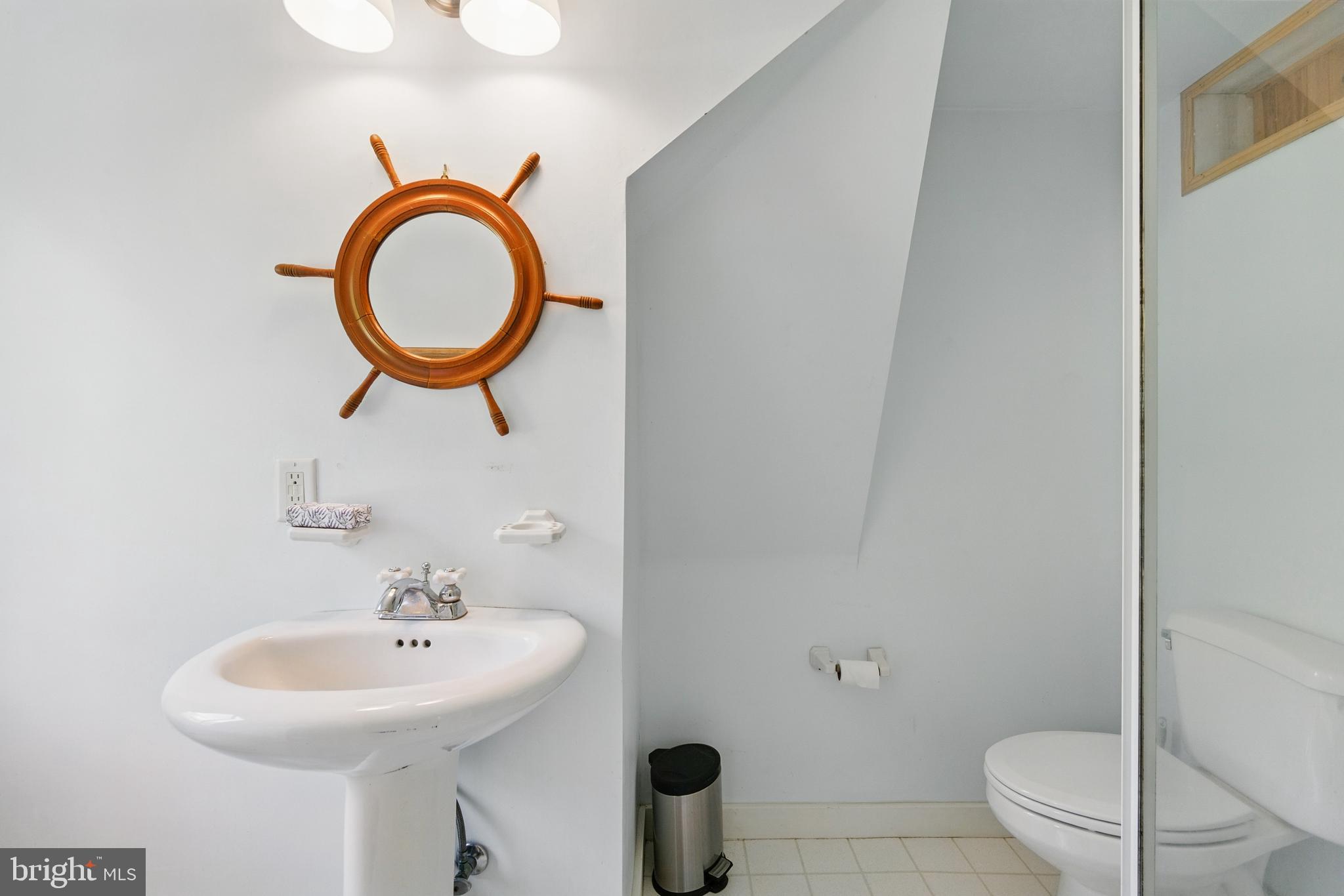 215 Dove Lane Elkton, MD 21921 - Photo 22 of 46 a bathroom with a sink a toilet and a mirror