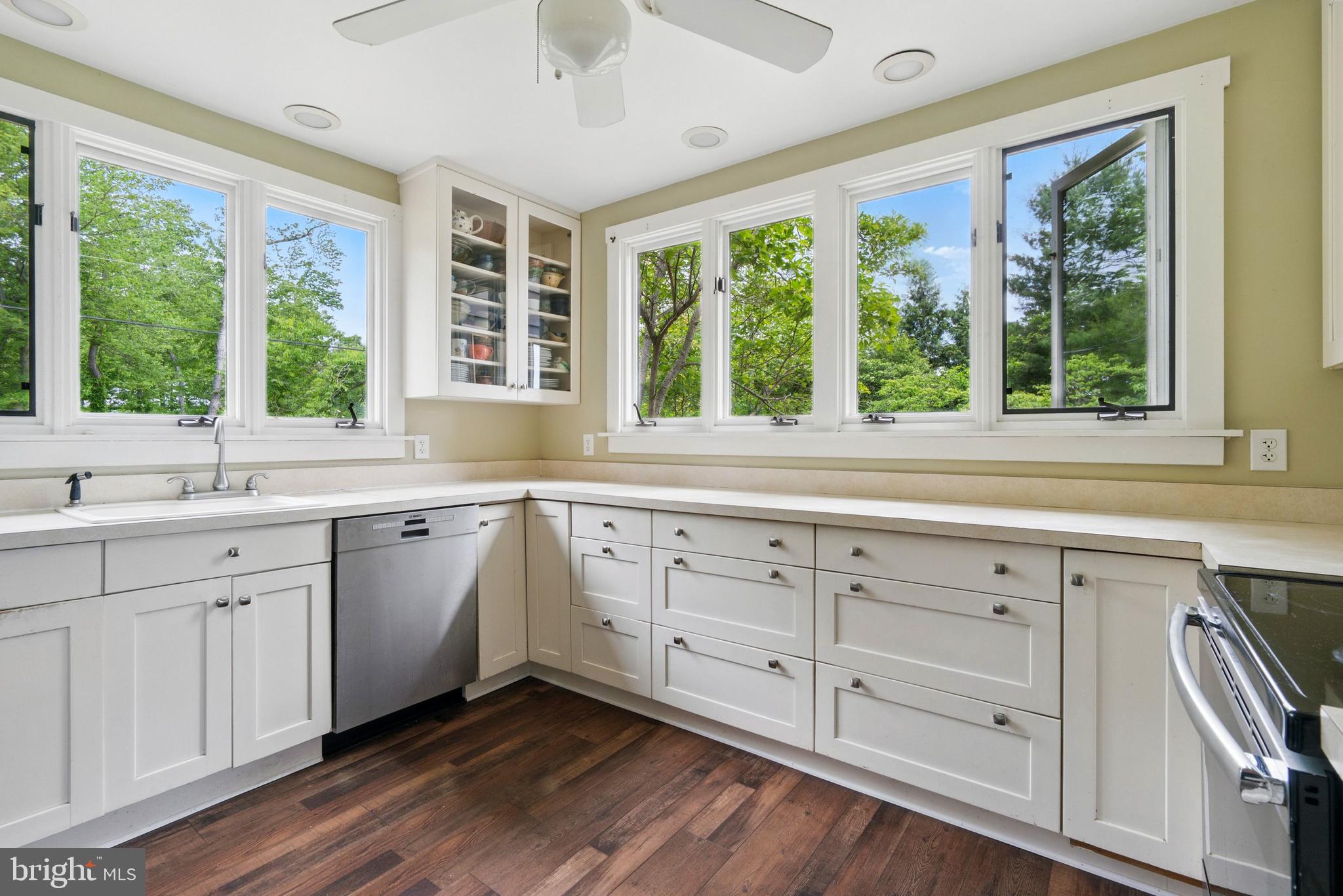 215 Dove Lane Elkton, MD 21921 - Photo 23 of 46 a white cabinets a sink and dishwasher with wooden floor