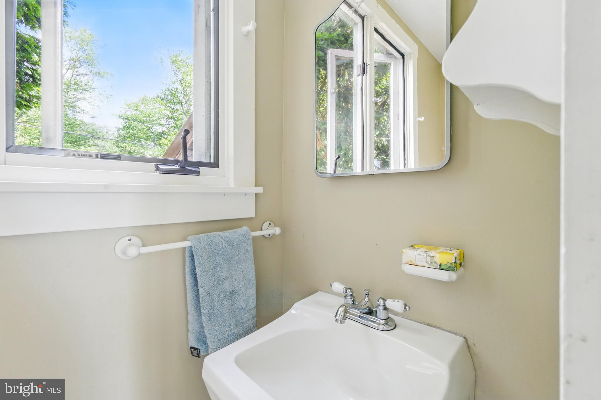 215 Dove Lane Elkton, MD 21921 - Photo 33 of 46 a bathroom with a sink and a mirror
