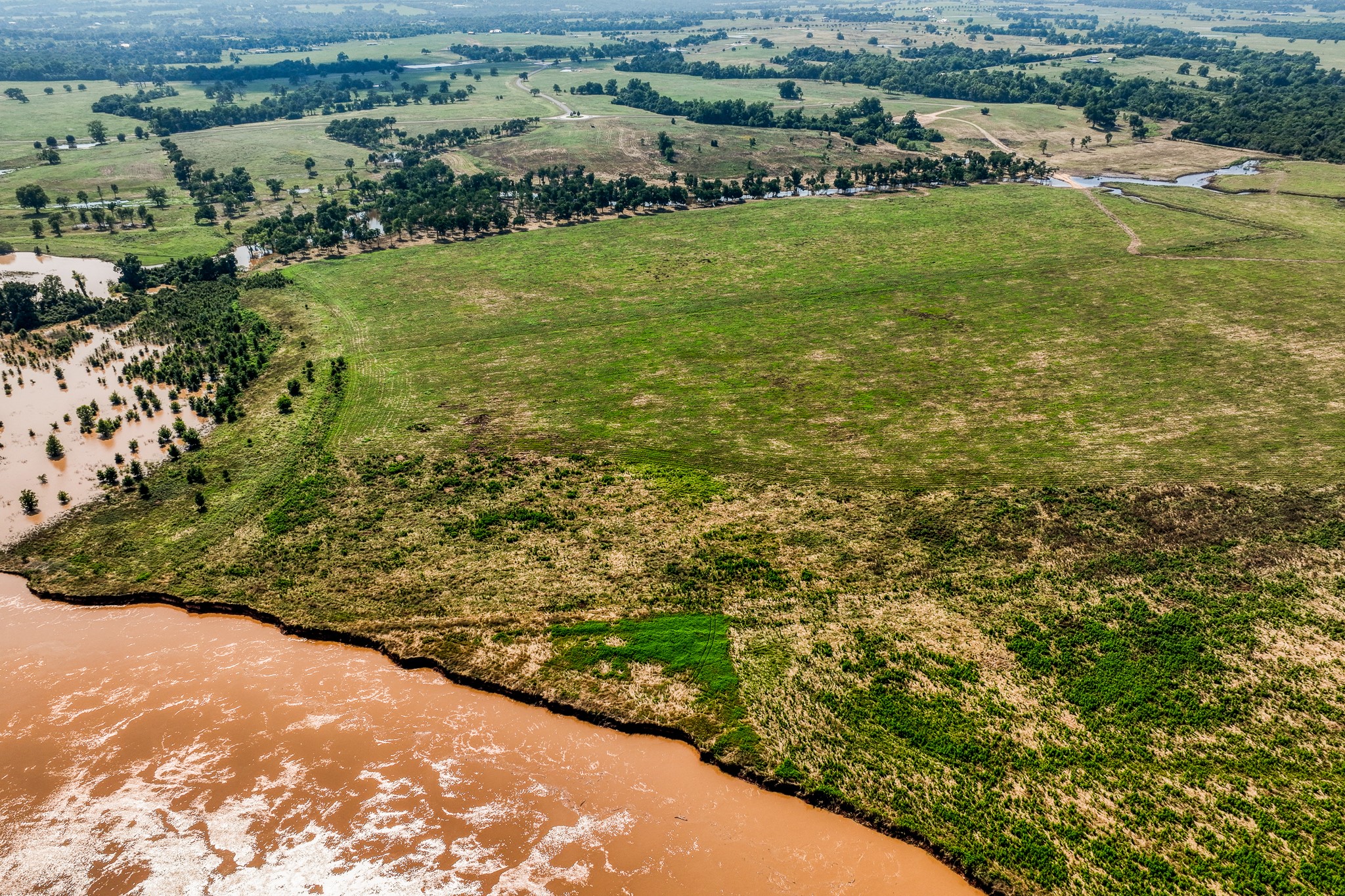 6164 Brazos Bow Way Washington, TX 77880 - Photo 30 of 43 a view of a field with an ocean view