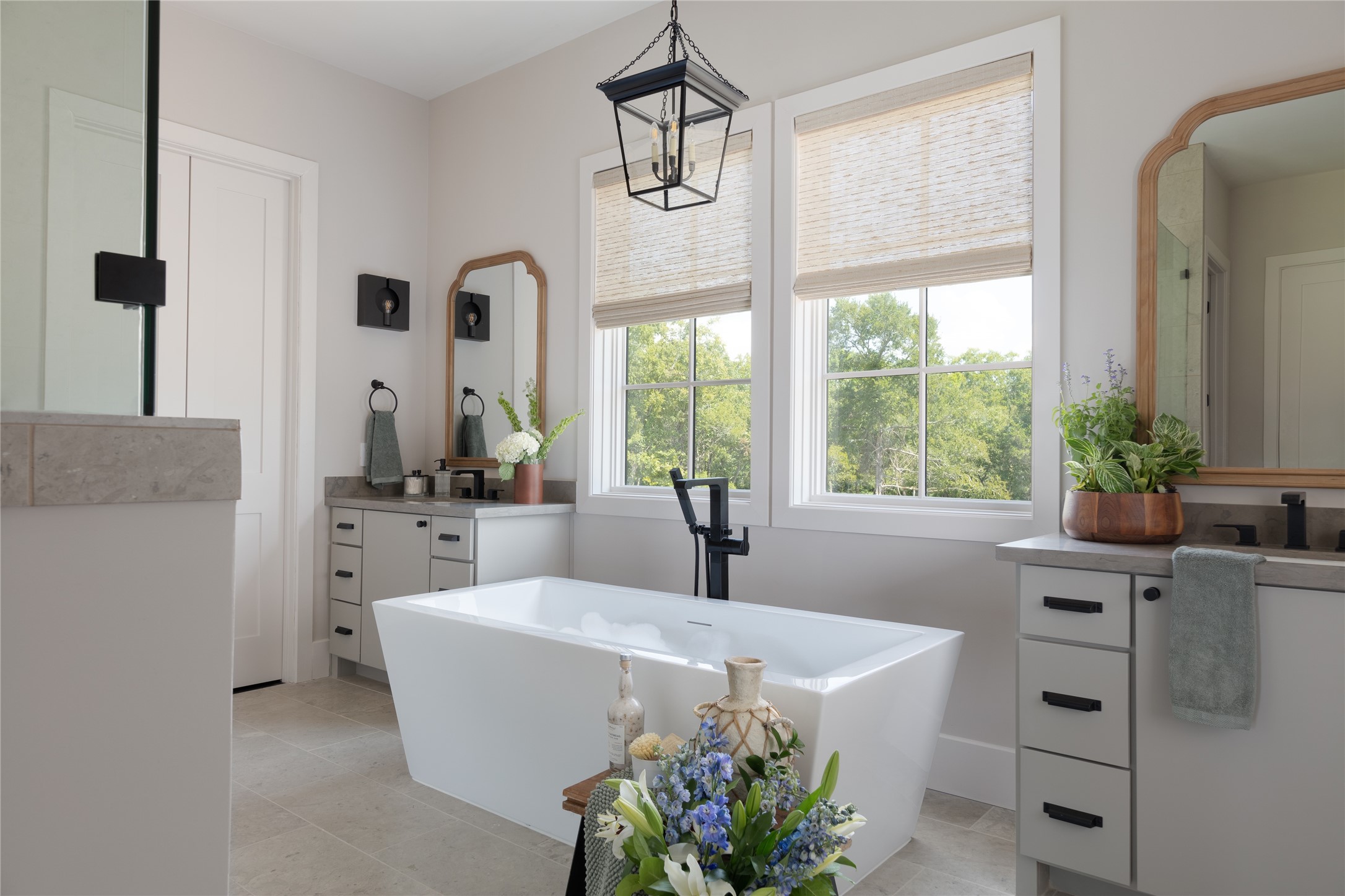 6164 Brazos Bow Way Washington, TX 77880 - Photo 8 of 43 a living room with furniture a window and a chandelier