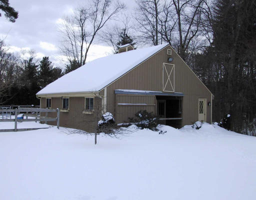 16 Crockett Road Upton, MA 01757 - Photo 2 of 3 a view of a house with yard and sitting area