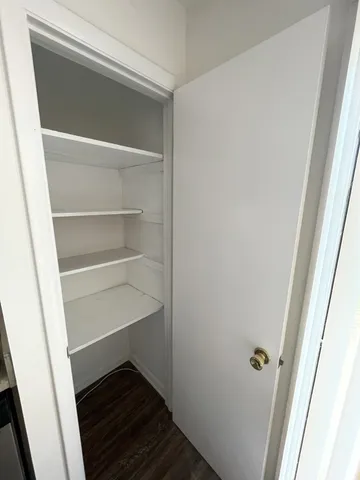 a storage room with washer and dryer