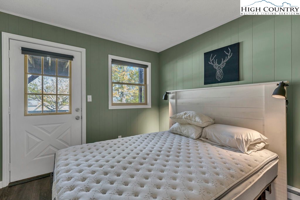 101 Hornbeam Road, Unit 2B Beech Mountain, NC 28604 - Photo 11 of 35 a bedroom with a bed and a window