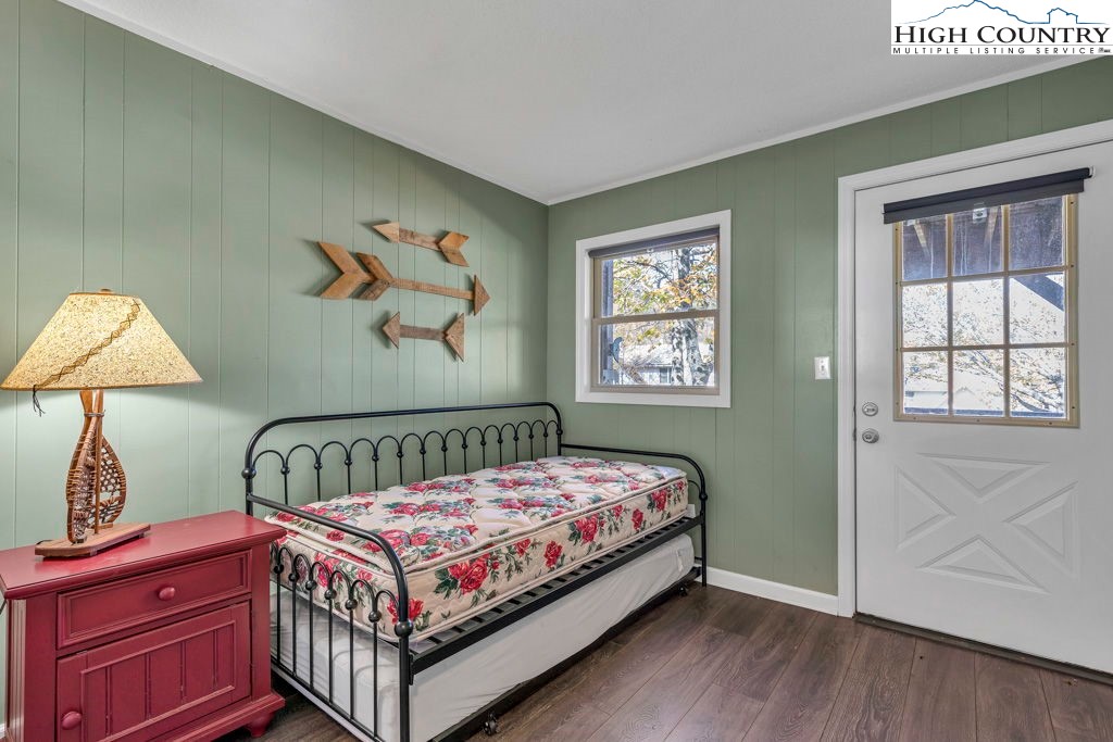 101 Hornbeam Road, Unit 2B Beech Mountain, NC 28604 - Photo 13 of 35 a bedroom with a bed and a window