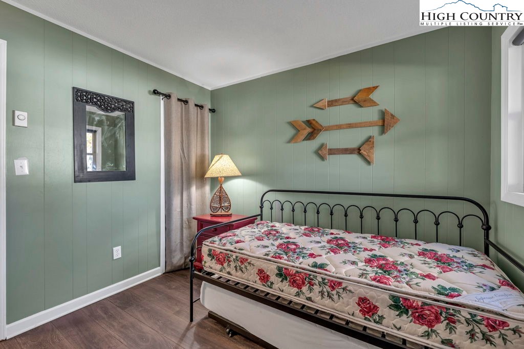 101 Hornbeam Road, Unit 2B Beech Mountain, NC 28604 - Photo 14 of 35 a bedroom with a bed and a window