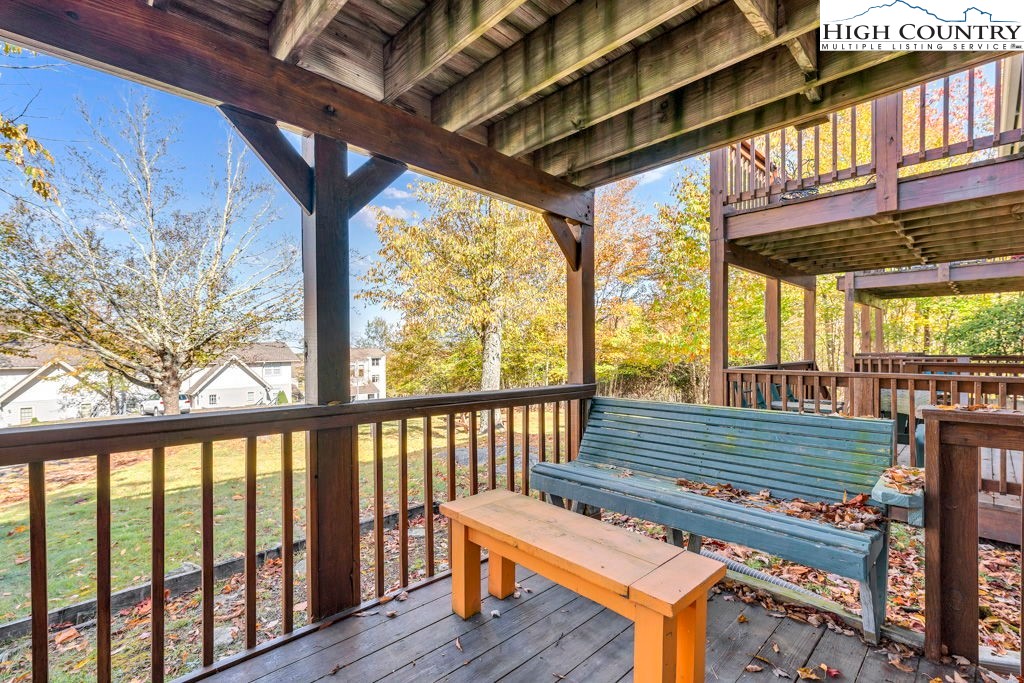 101 Hornbeam Road, Unit 2B Beech Mountain, NC 28604 - Photo 16 of 35 a view of a porch with wooden floor
