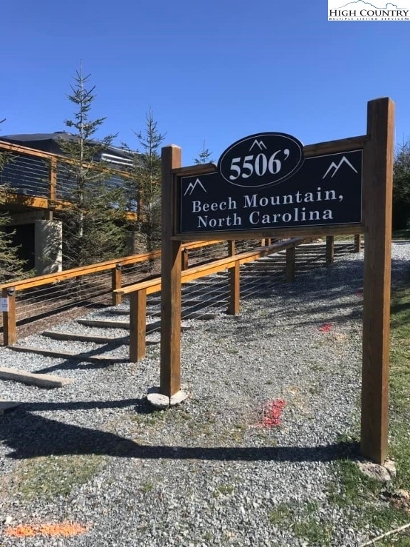 101 Hornbeam Road, Unit 2B Beech Mountain, NC 28604 - Photo 26 of 35 a view of a park with a bench in front of it