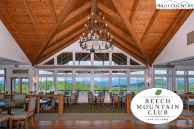 101 Hornbeam Road, Unit 2B Beech Mountain, NC 28604 - Photo 28 of 35 a view of a dining room with furniture window and outside view
