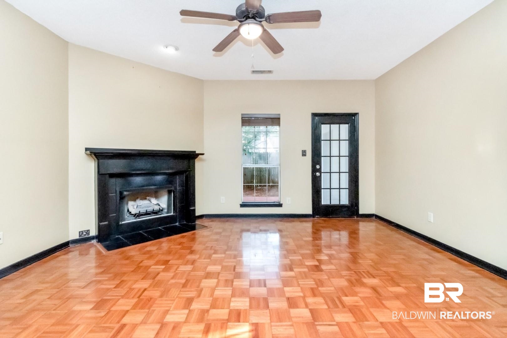 152 Ideal Avenue Mobile, AL 36608 - Photo 19 of 32 Unfurnished living room with ceiling fan and light parquet flooring