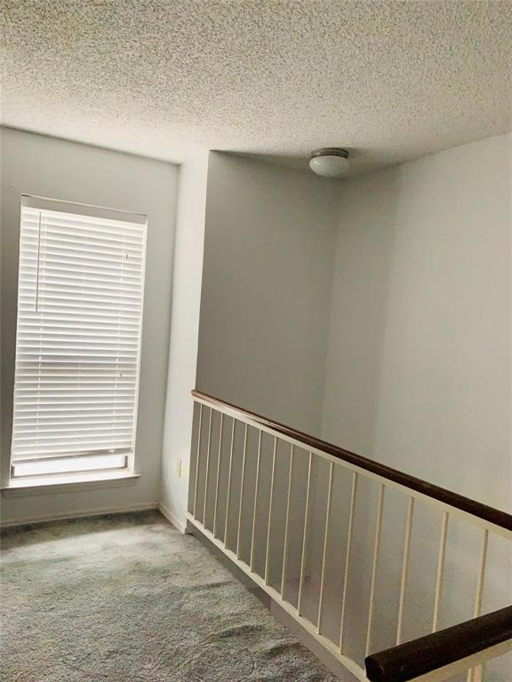 1111 Bert Drive, Unit C Arlington, TX 76012 - Photo 5 of 11 a view of a porch with a window