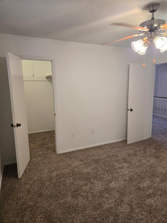 1111 Bert Drive, Unit C Arlington, TX 76012 - Photo 6 of 11 an empty room with a mirror