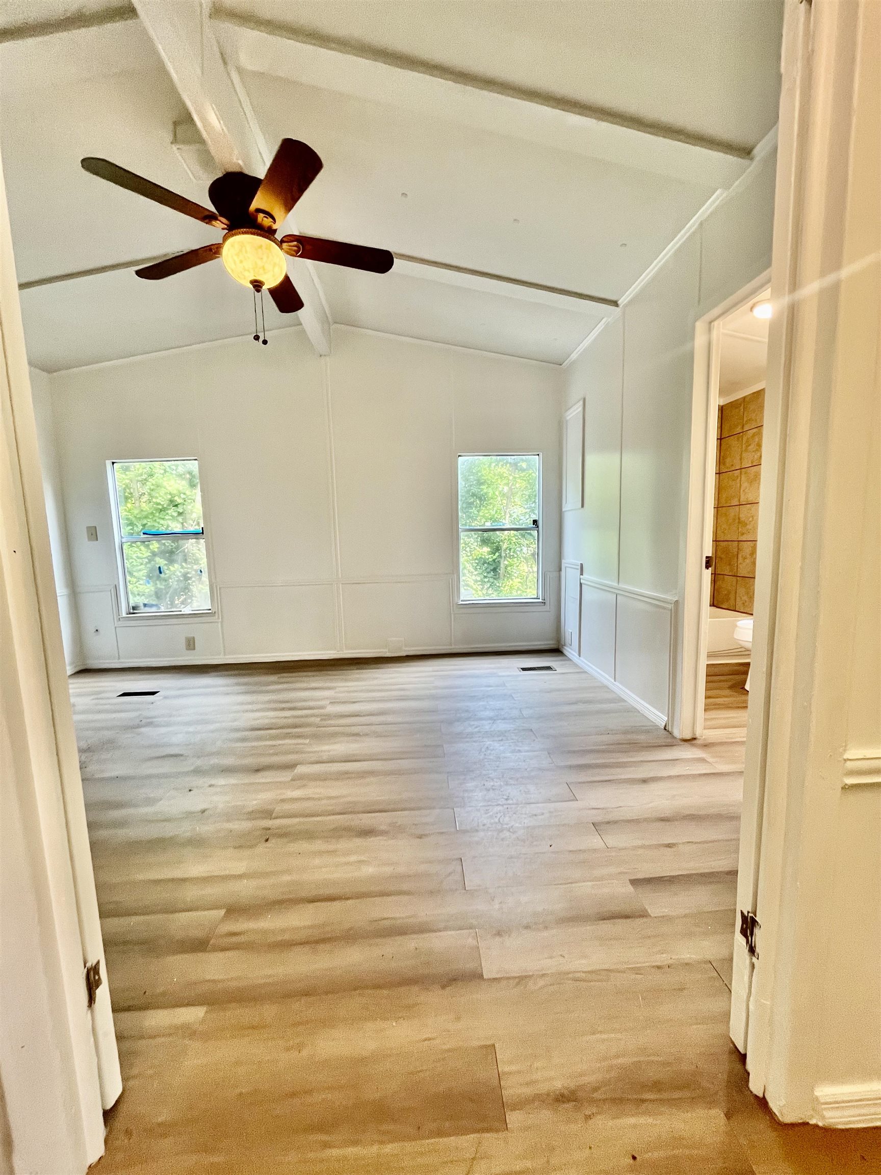 23670 Northeast 154th Place Road Salt Springs, FL 32134 - Photo 18 of 65 a view of a room with a window and a ceiling fan