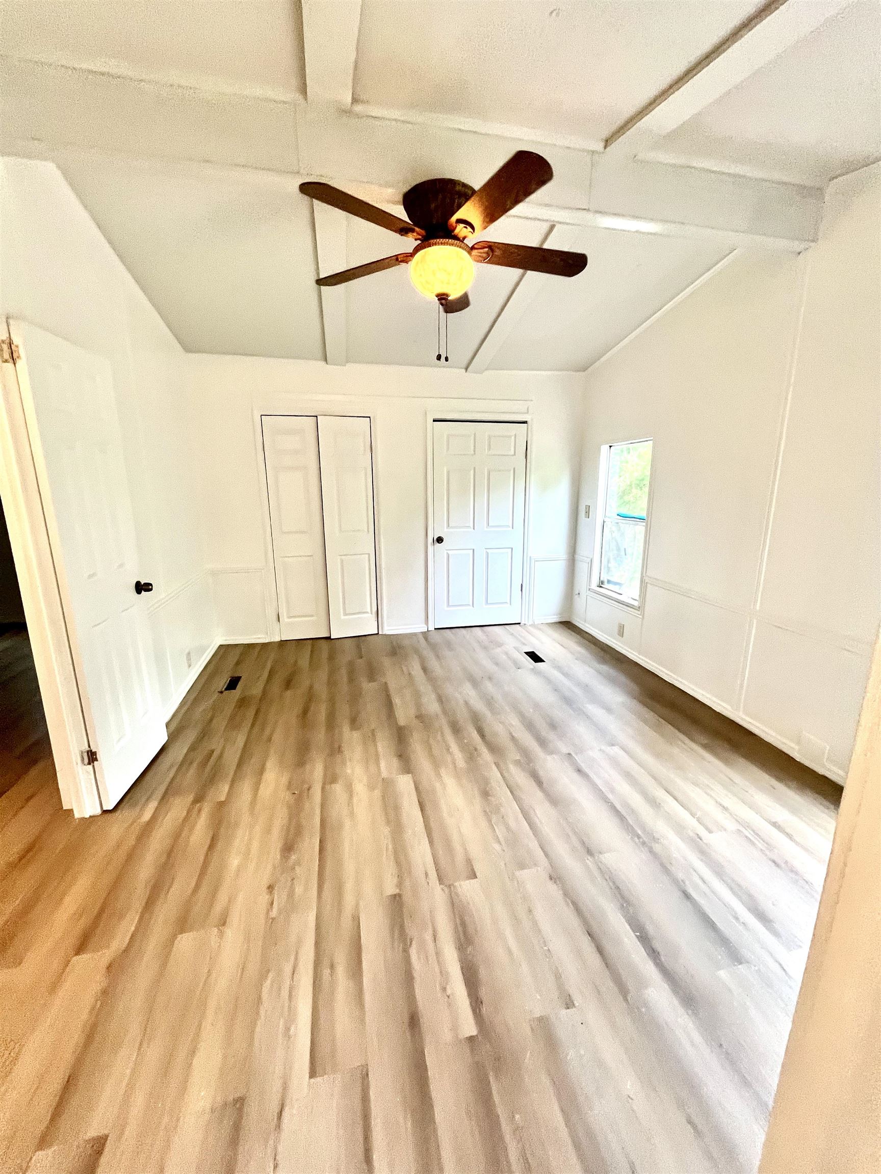 23670 Northeast 154th Place Road Salt Springs, FL 32134 - Photo 23 of 65 a view of a room with wooden floor