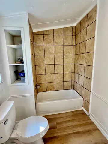 a view of a room with a large window