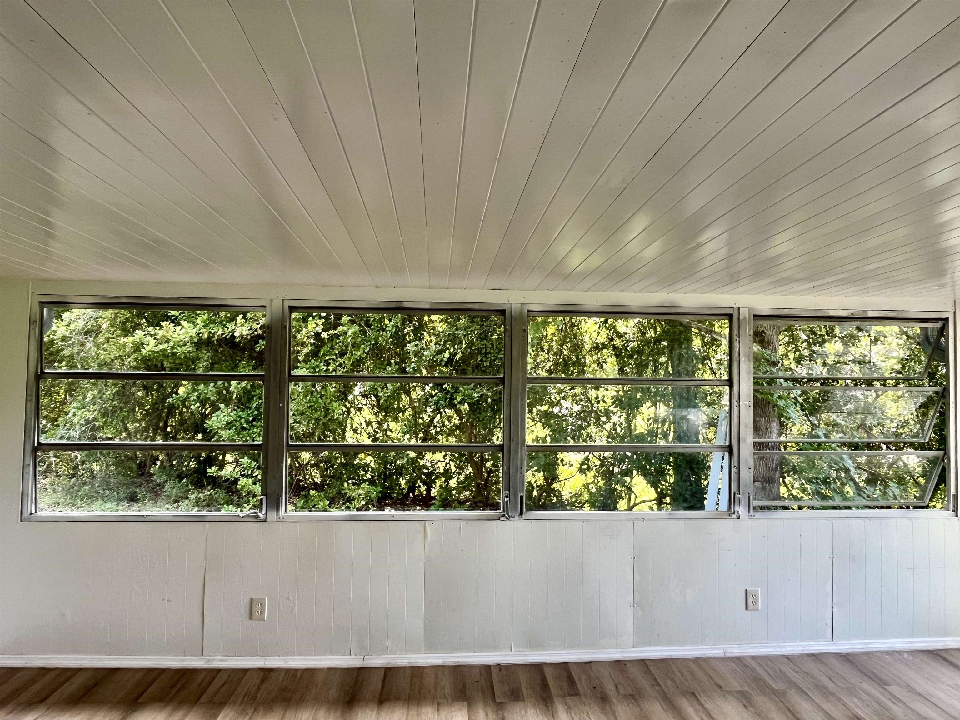 23670 Northeast 154th Place Road Salt Springs, FL 32134 - Photo 29 of 65 a view of an empty room with a window