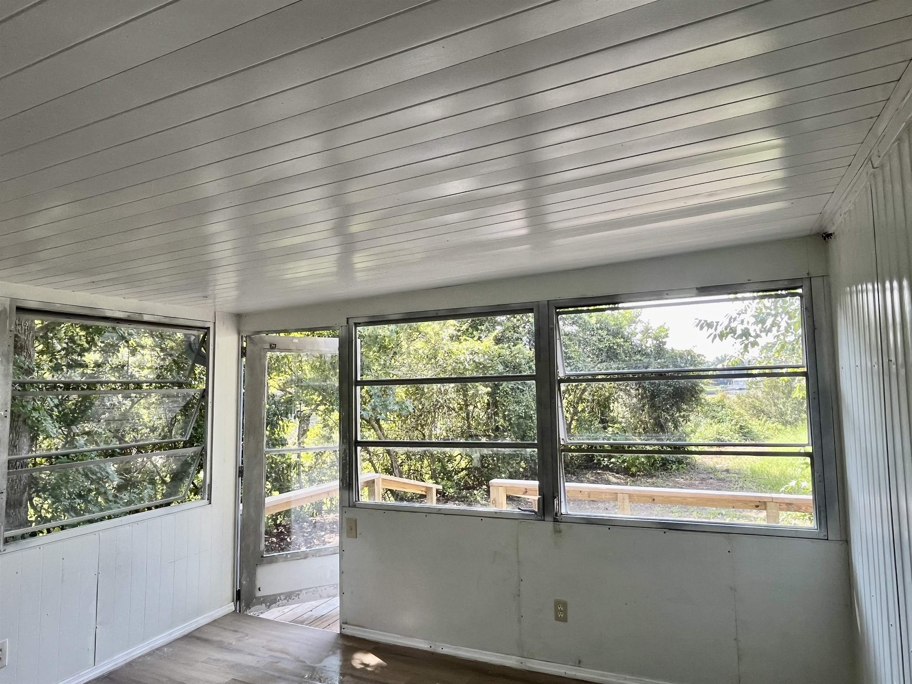23670 Northeast 154th Place Road Salt Springs, FL 32134 - Photo 30 of 65 a view of a room with a large window