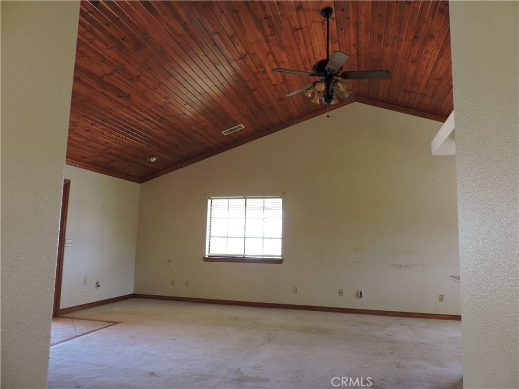 5480 Sunnyslope Road Phelan, CA 92371 - Photo 11 of 47 an empty room with windows