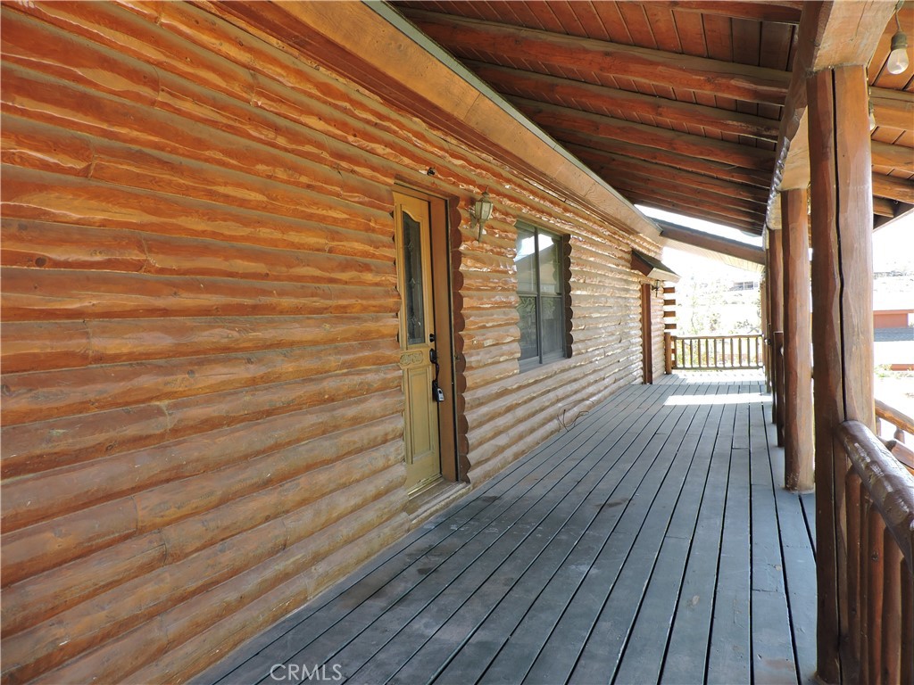 5480 Sunnyslope Road Phelan, CA 92371 - Photo 19 of 47 a view of outdoor space with wooden floor