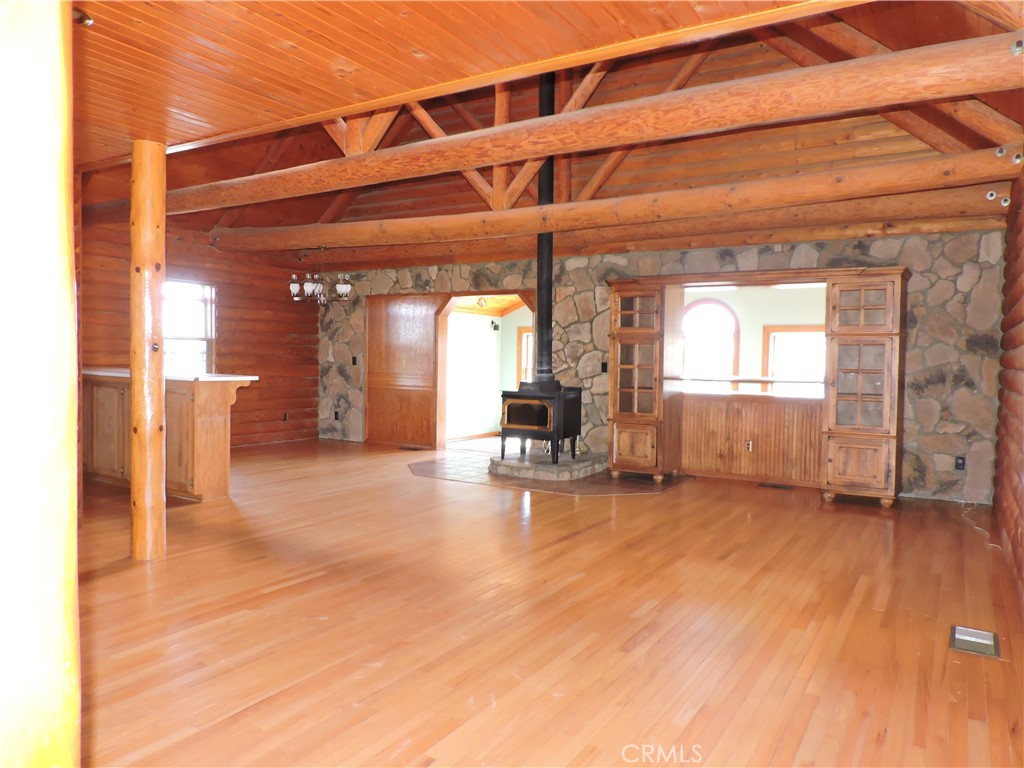 5480 Sunnyslope Road Phelan, CA 92371 - Photo 20 of 47 a view of a livingroom with a furniture and fireplace