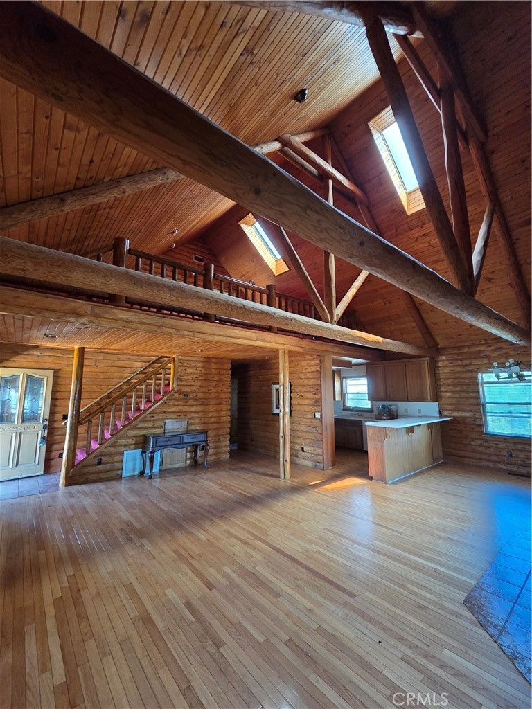 5480 Sunnyslope Road Phelan, CA 92371 - Photo 21 of 47 a view of a room with wooden floors