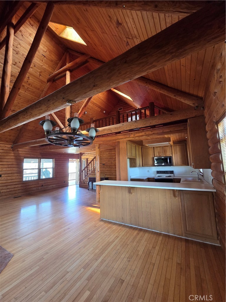 5480 Sunnyslope Road Phelan, CA 92371 - Photo 22 of 47 a view of a room with wooden floors