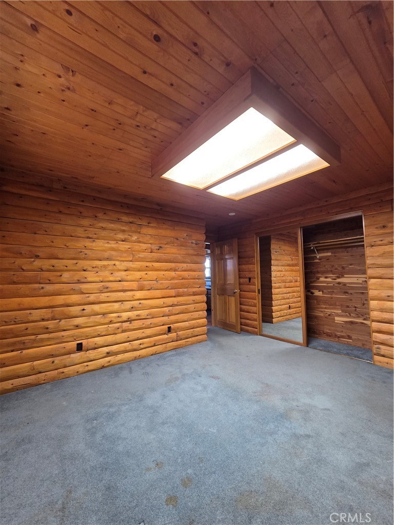 5480 Sunnyslope Road Phelan, CA 92371 - Photo 25 of 47 a view of an empty room with a window