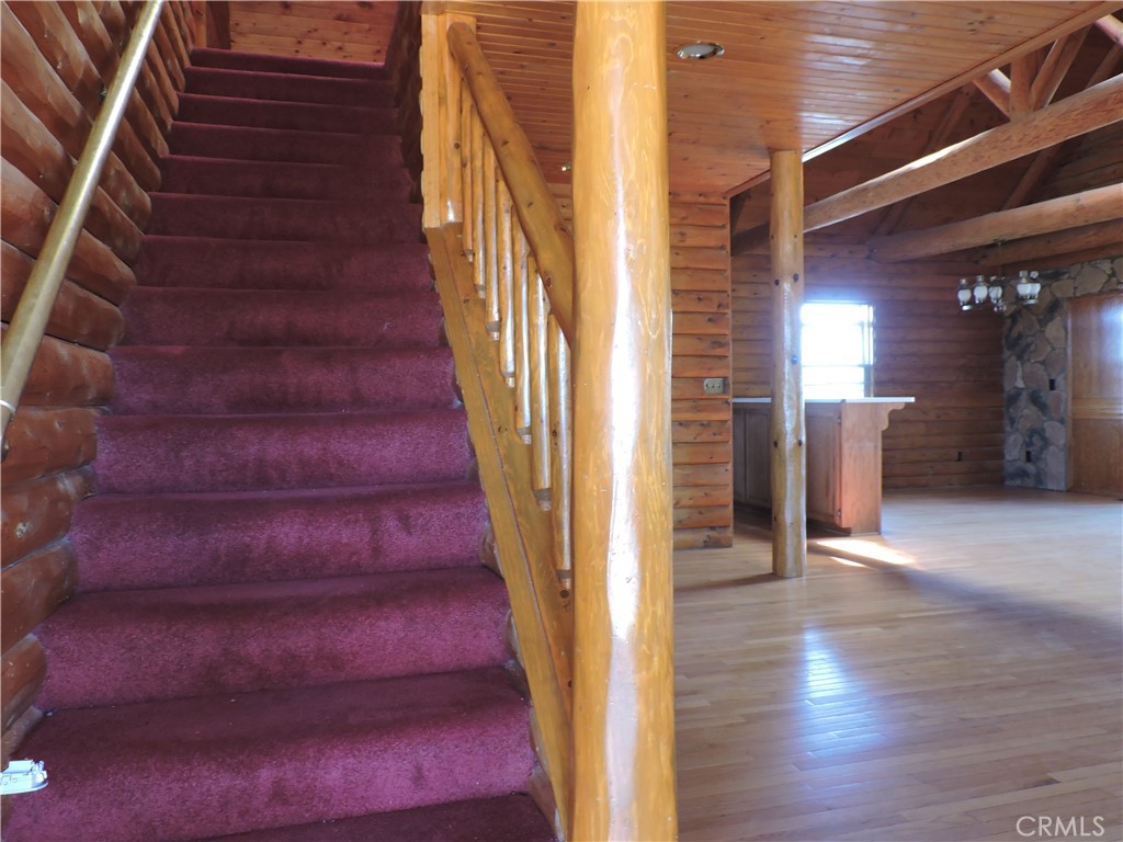 5480 Sunnyslope Road Phelan, CA 92371 - Photo 29 of 47 a view of entryway and hall with wooden floor