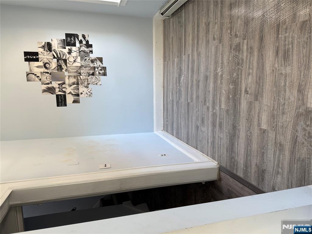 129 Orient Way, Unit 2 Lyndhurst, NJ 07071 - Photo 12 of 29 a view of a hallway with wooden floor