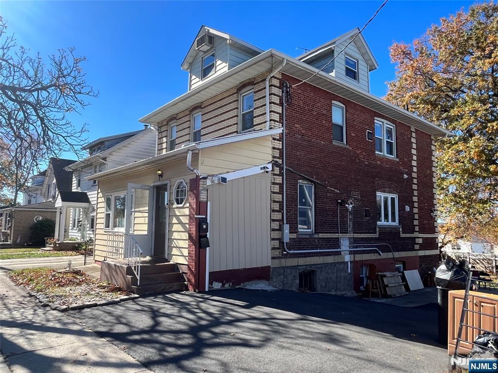 129 Orient Way, Unit 2 Lyndhurst, NJ 07071 - Photo 2 of 29 a view of a house with a patio