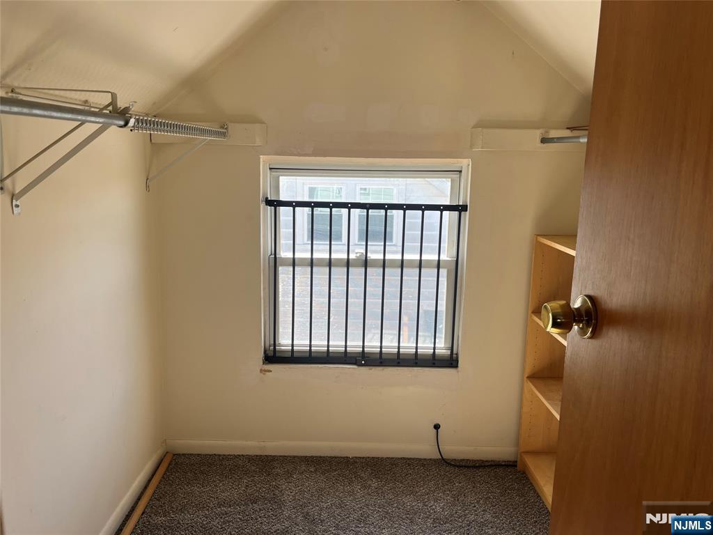 129 Orient Way, Unit 2 Lyndhurst, NJ 07071 - Photo 25 of 29 a view of an empty room with a window