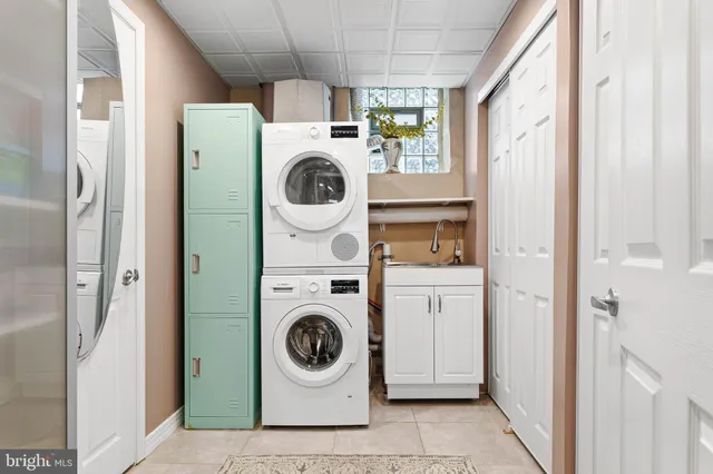 a utility room with dryer and washer