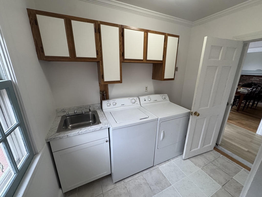 191 Chestnut Street, Unit 1 Duxbury, MA 02332 - Photo 14 of 20 a utility room with dryer and washer