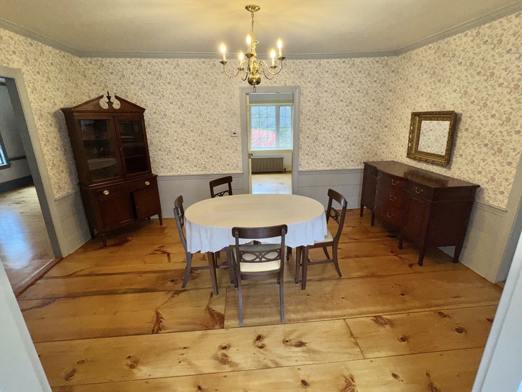 191 Chestnut Street, Unit 1 Duxbury, MA 02332 - Photo 6 of 20 a view of a dining room with furniture