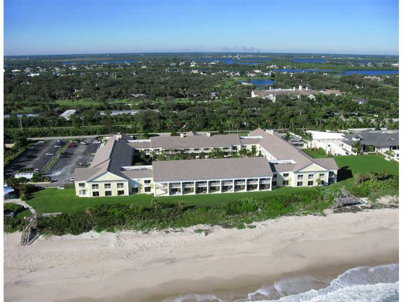 400 Beach Road, Unit 141 Vero Beach, FL 32963 - Photo 1 of 11 an aerial view of residential houses with city view