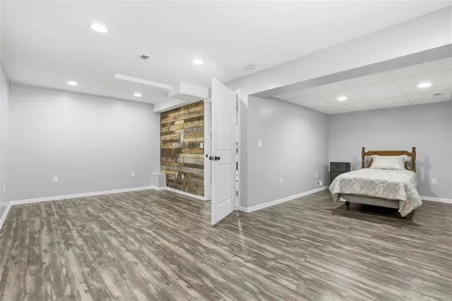 a bedroom with a bed and closet