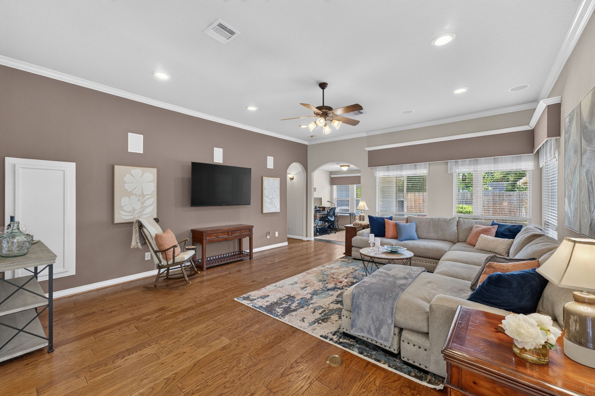 514 Oak Ridge Grove Circle Spring, TX 77386 - Photo 10 of 35 This inviting reverse view showcases the family room’s generous proportions and the easy connection between the home’s main living spaces.